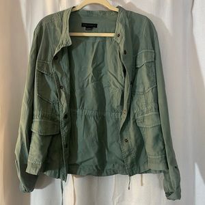 teal/green light jacket